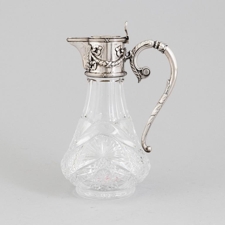 A Russian caraffe with silver mounts marked i cyrillic V Gordon, Early 20th century.