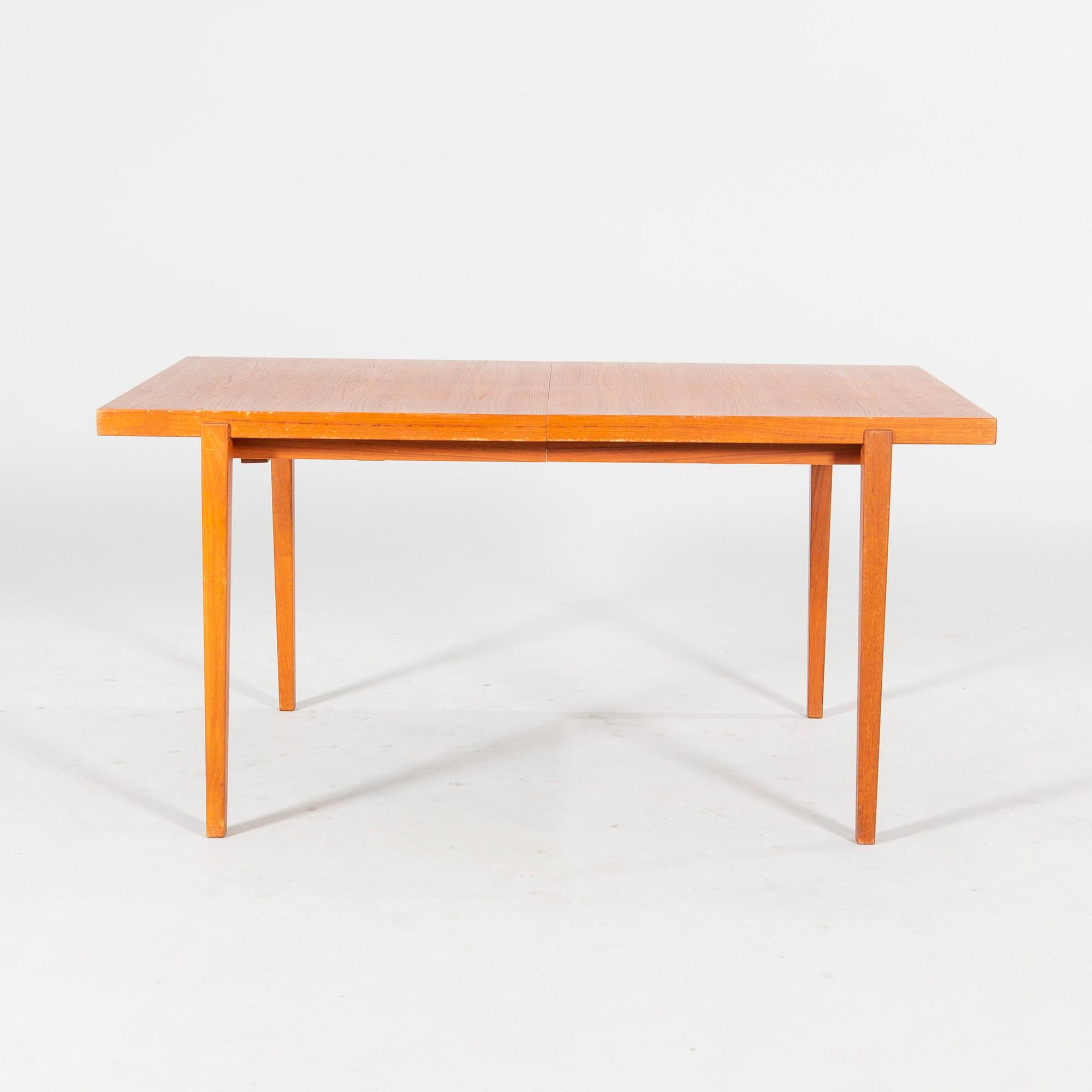 A mid 20th century dining table.