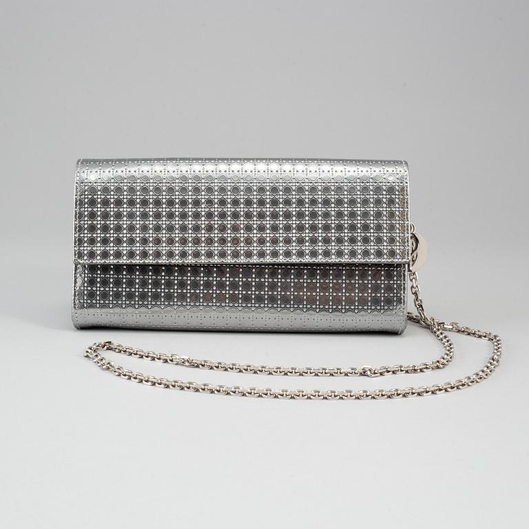 CHRISTIAN DIOR, an embossed metallic leather 'Wallet on Chain' clutch.