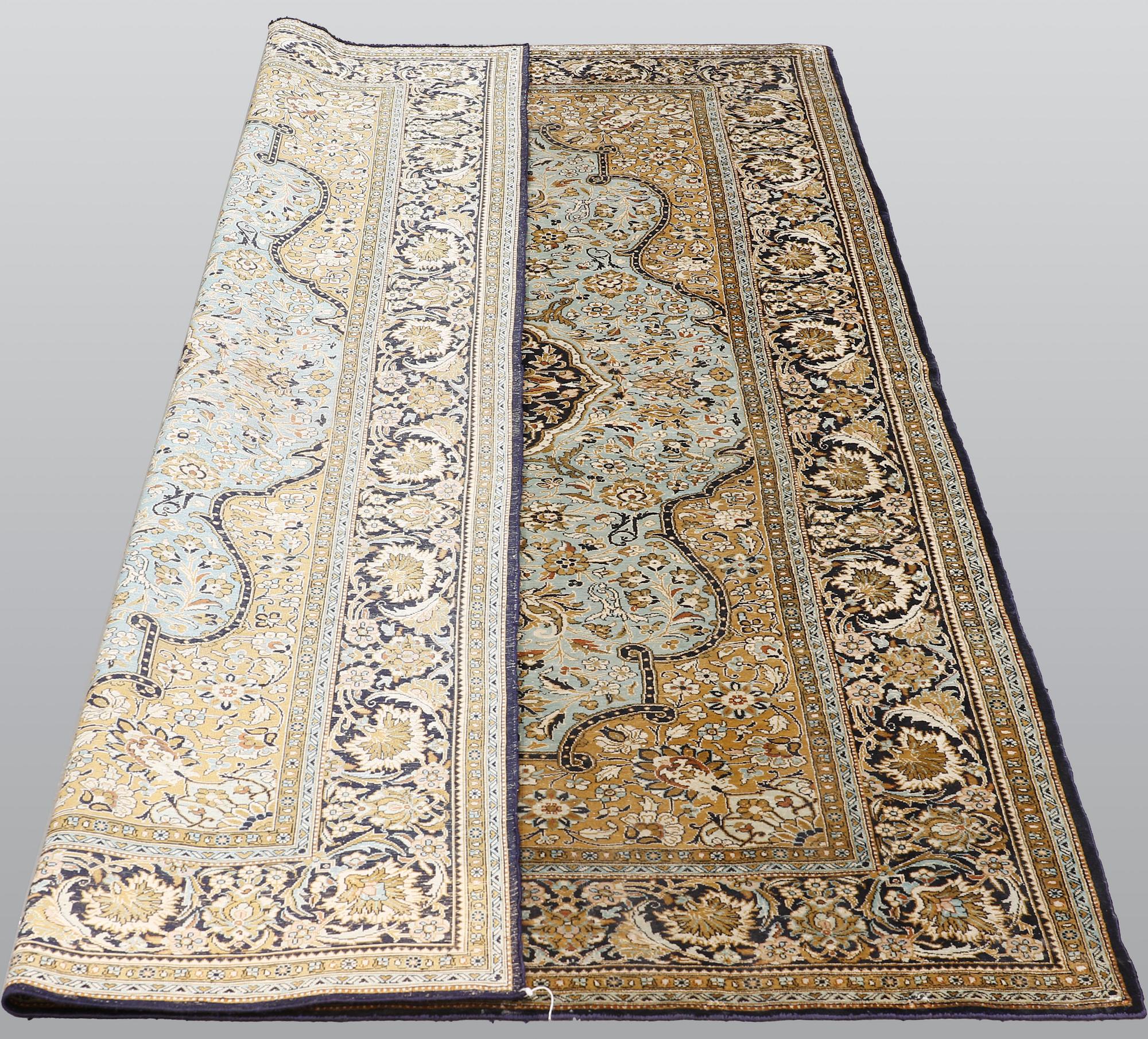 A carpet, silk Qum, ca 203 x 134 cm.