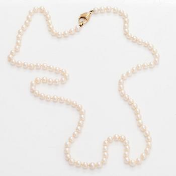 A cultured Akoya pearl necklace, clasp in 18K gold set with eight-cut diamonds. Swedish control mark.