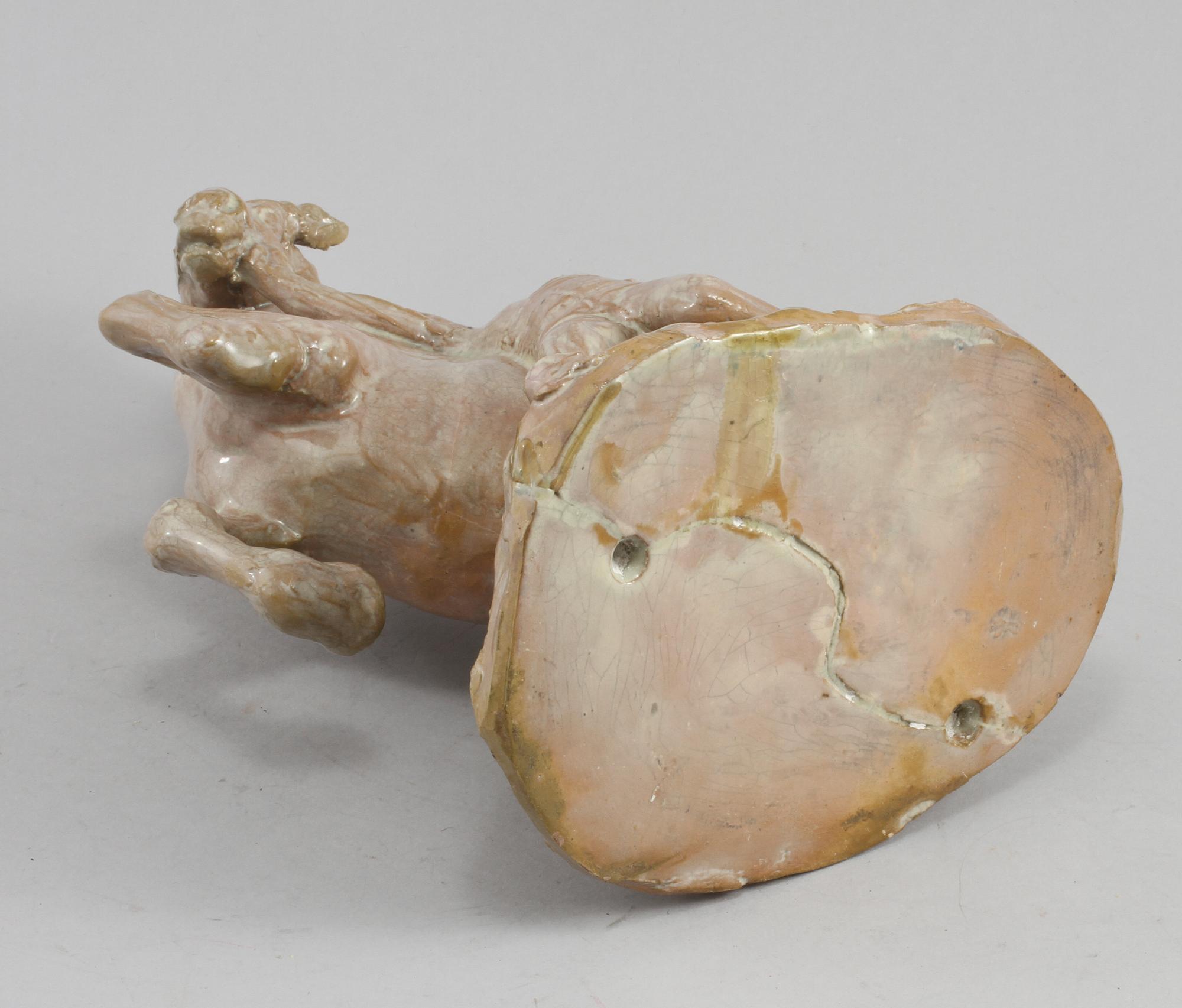 FIGURIN, stengods, signerad KA och och daterad 1921.