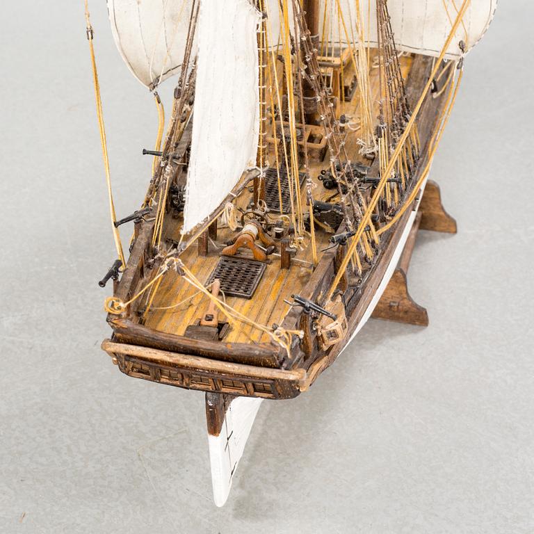 A 20th century wooden ship model.