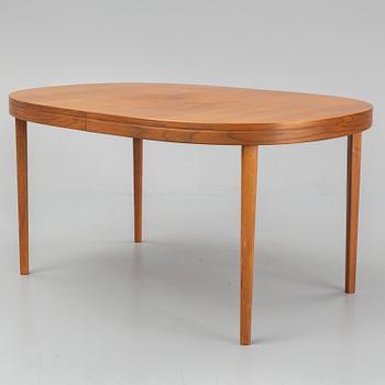A walnut veneer table from the second half of the 20th century.