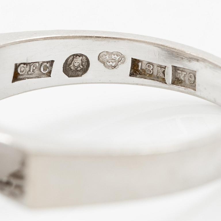 A ring 18K white gold set with an opal and eight-cut diamonds. CF Carlman, Stockholm 1973.