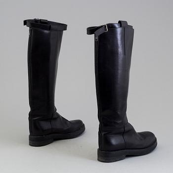 a pair of Ann Demeulemeester, "Vitello Lucido Nero Riding Boots". Size 38.