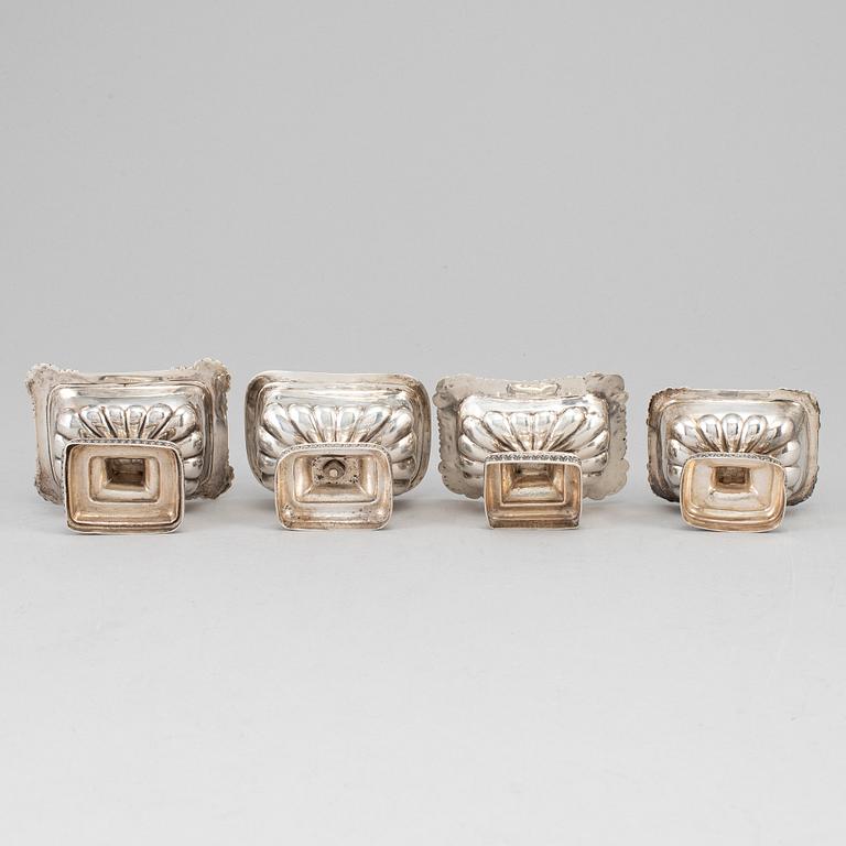 Four Russian 19th century parcel-gilt silver salt cellars, St. Petersburg and Moscow.