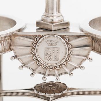 A French Empire silver cruet stand and a pair of openwork stands, Paris 1819-1838.