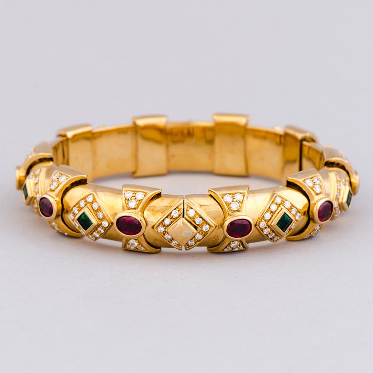 A BRACELET, facetted emeralds and rubies, brilliant cut diamonds, 18K gold.