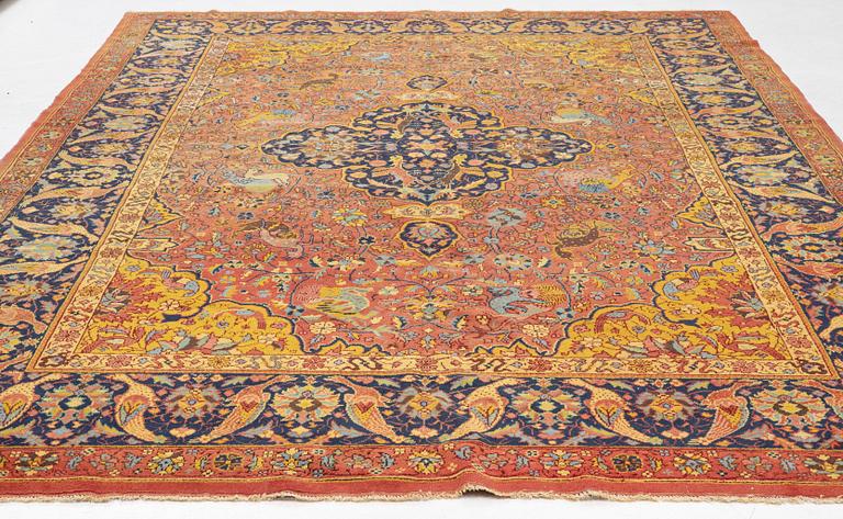 A carpet, antique/semi-antique Turkish/Indian, approx. 330 x 234 cm.