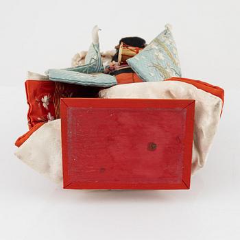 A Japanese doll, early 20th Century.