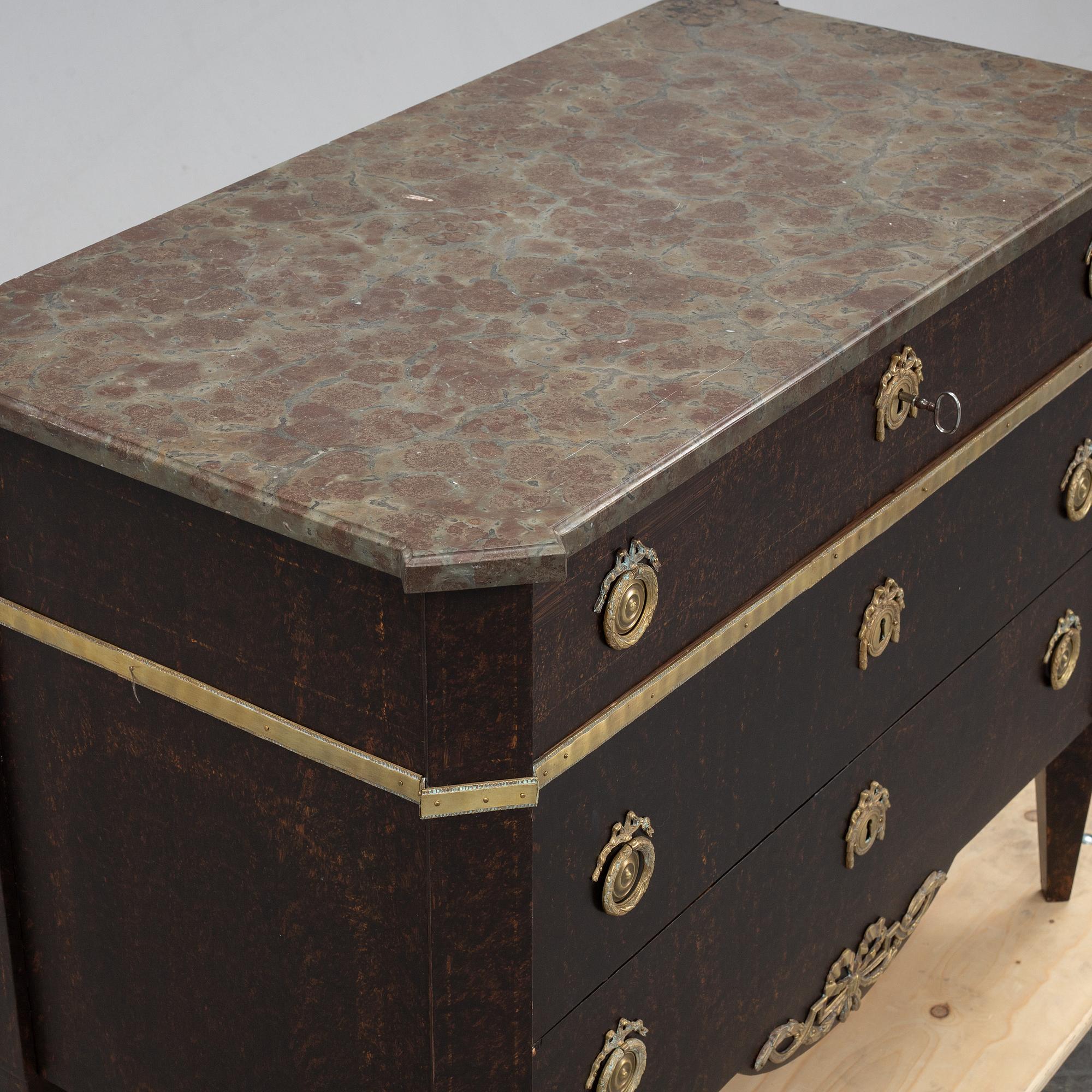 A gustavian style chest of drawers, early 20th century.