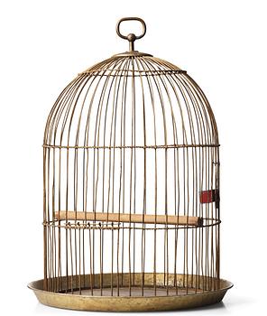 Firma Svenskt Tenn, a brass coloured metal birdcage, first half of 20th century, provenance Estrid Ericson.