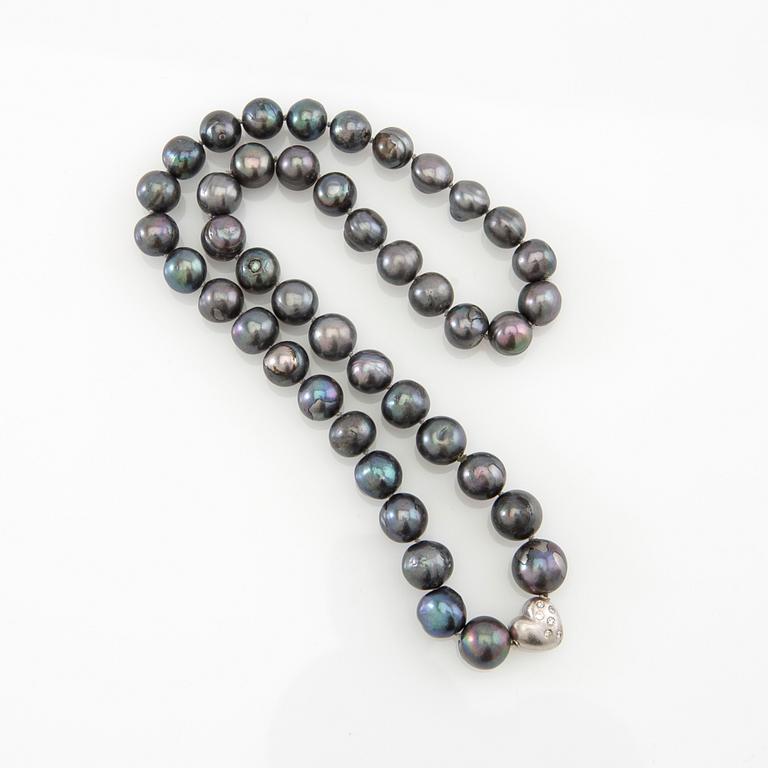 Ole Lynggaard, Lock 18K white gold with accompanying necklace of cultured pearls.