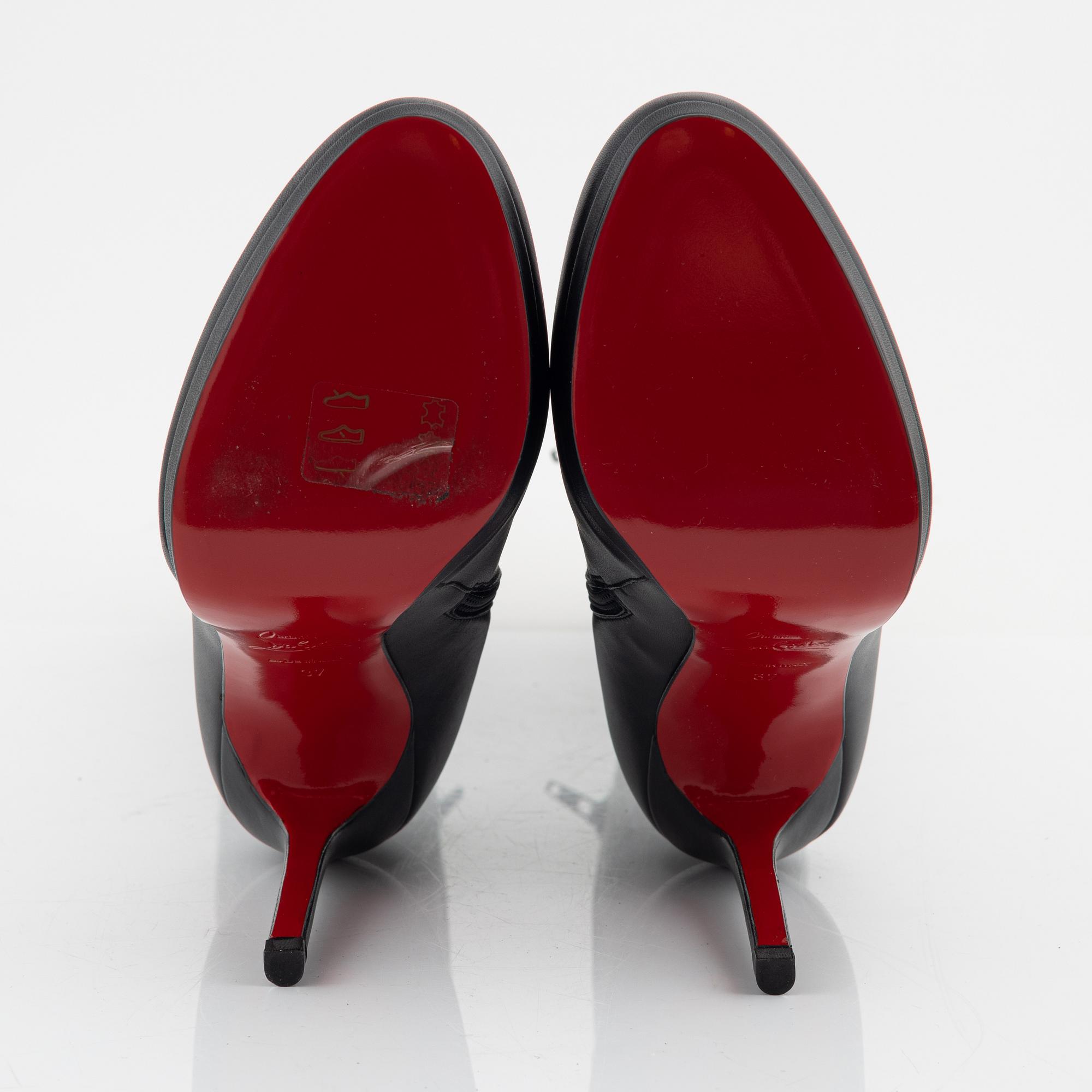 Christian Louboutin, a pair of black leather stiletto boots, size 37.