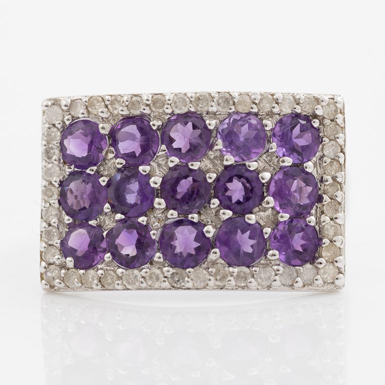 Ring, 14K white gold with amethysts and small diamonds.