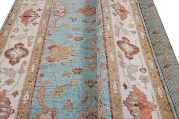 An oriental carpet with Mamluk-design, c. 303 x 239 cm.