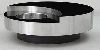 A Willy Rizzo revolving coffee table with bar, France, 1970s.