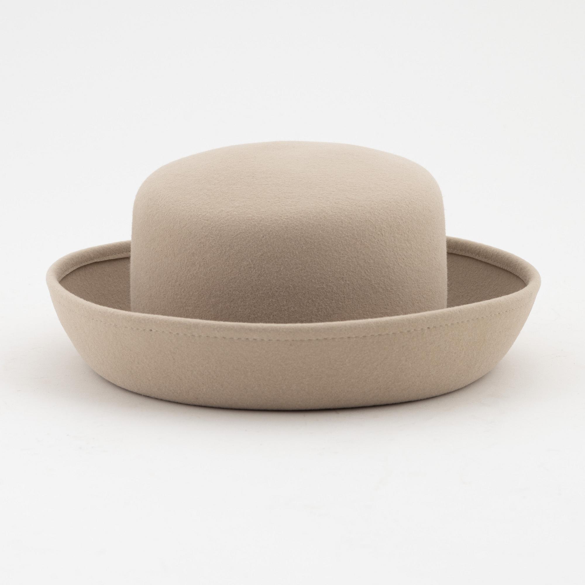 Chanel, a rabit hair hat with ribbon, size S.
