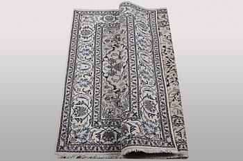 A rug, Nain, part silk, ca 200 x 195 cm.