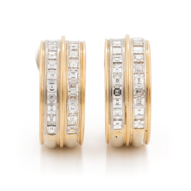 A pair of earrings with step cut diamonds, total carat weight circa 4.00 cts.