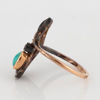 A 14K gold and silver Fedor Lorie ring set with a turquoise and old-cut diamonds.