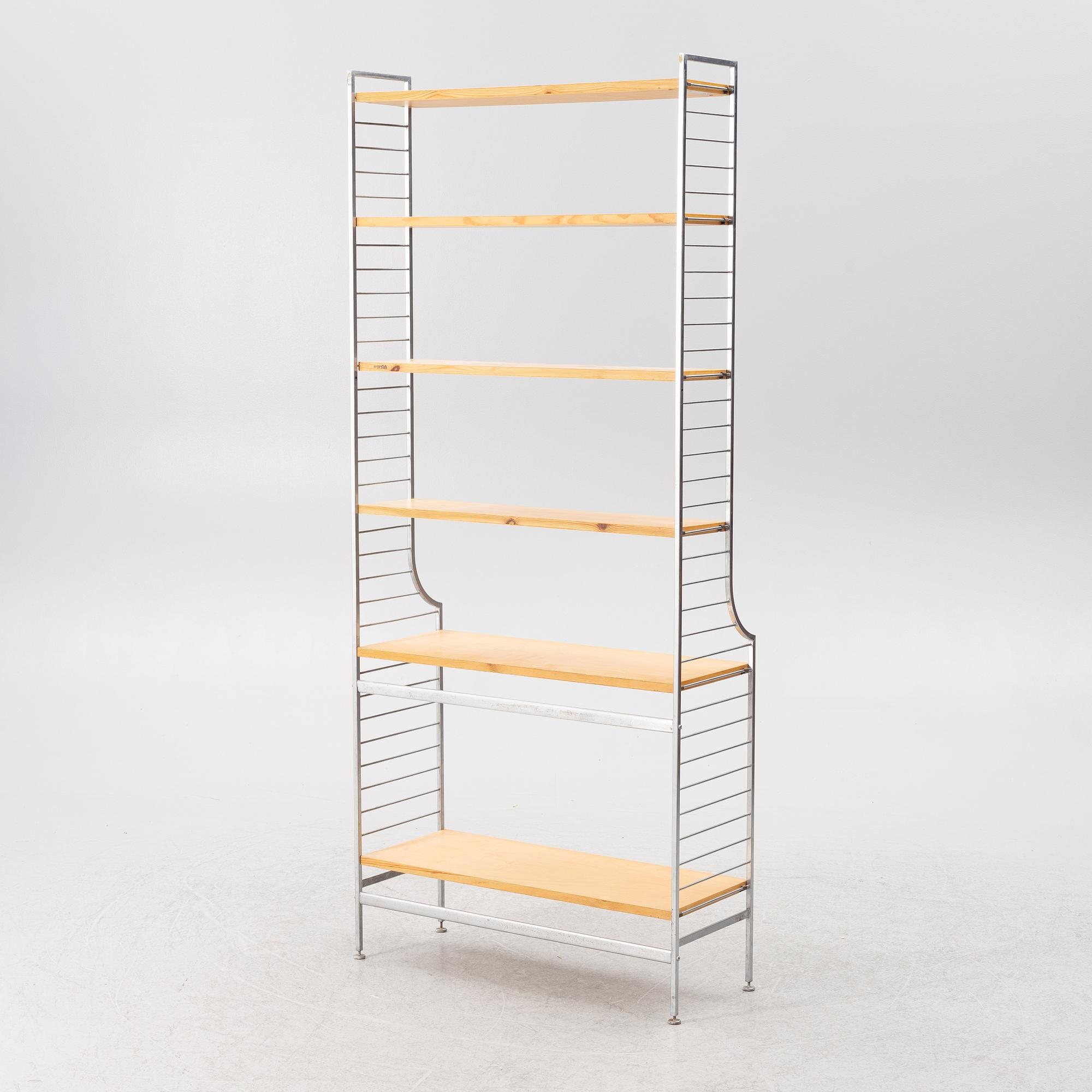 Nils Strinning, stringhylla, "Continental" 1900-talets mitt.