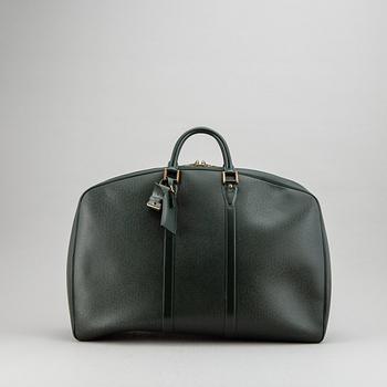 LOUIS VUITTON, 'Helanga' weekendbag with garment cover.