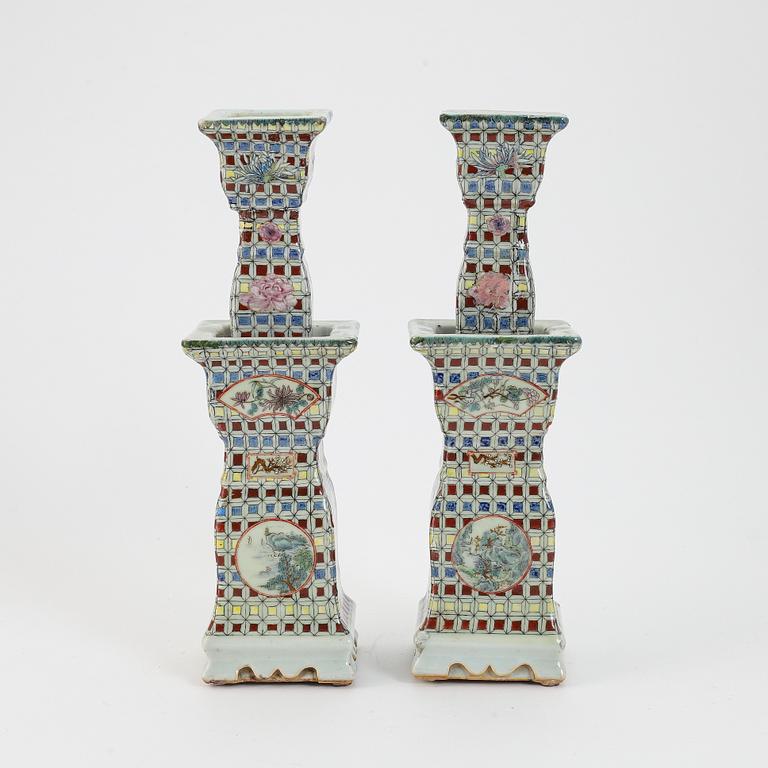 A pair of Chinese porcelain candlesticks, 19th century.