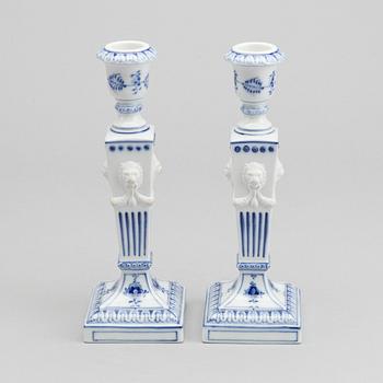 A PAIR OF ROYAL COPENHAGEN PORCELAIN CANDLE STICKS.