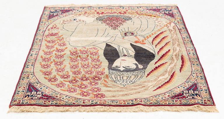An antique pictorial Kirman Lavar, ca 98 x 67 cm.
