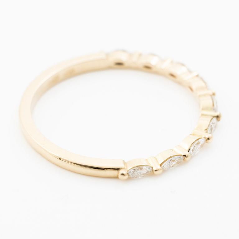 14K gold ring with marquise-cut diamonds.