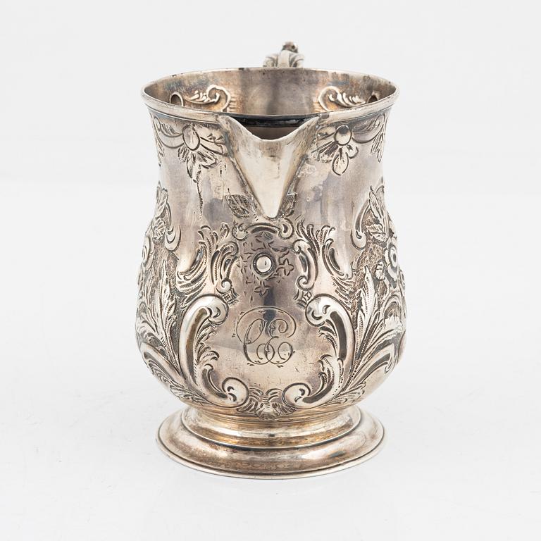An English silver creamer, London, 1887.