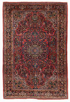 An American Sarouk rug, semi antique, c. 200 x 133 cm.