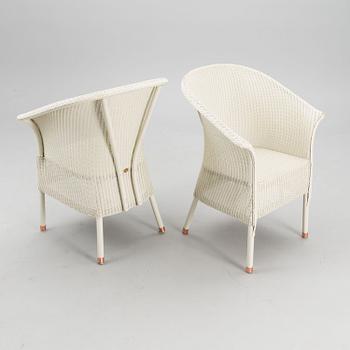 A PAIR OF ARM CHAIRS, Lloyd Loom, Spalding, England,  21st century.