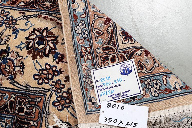 A carpet, Nain, part silk, 6 laa, ca 350 x 215 cm.