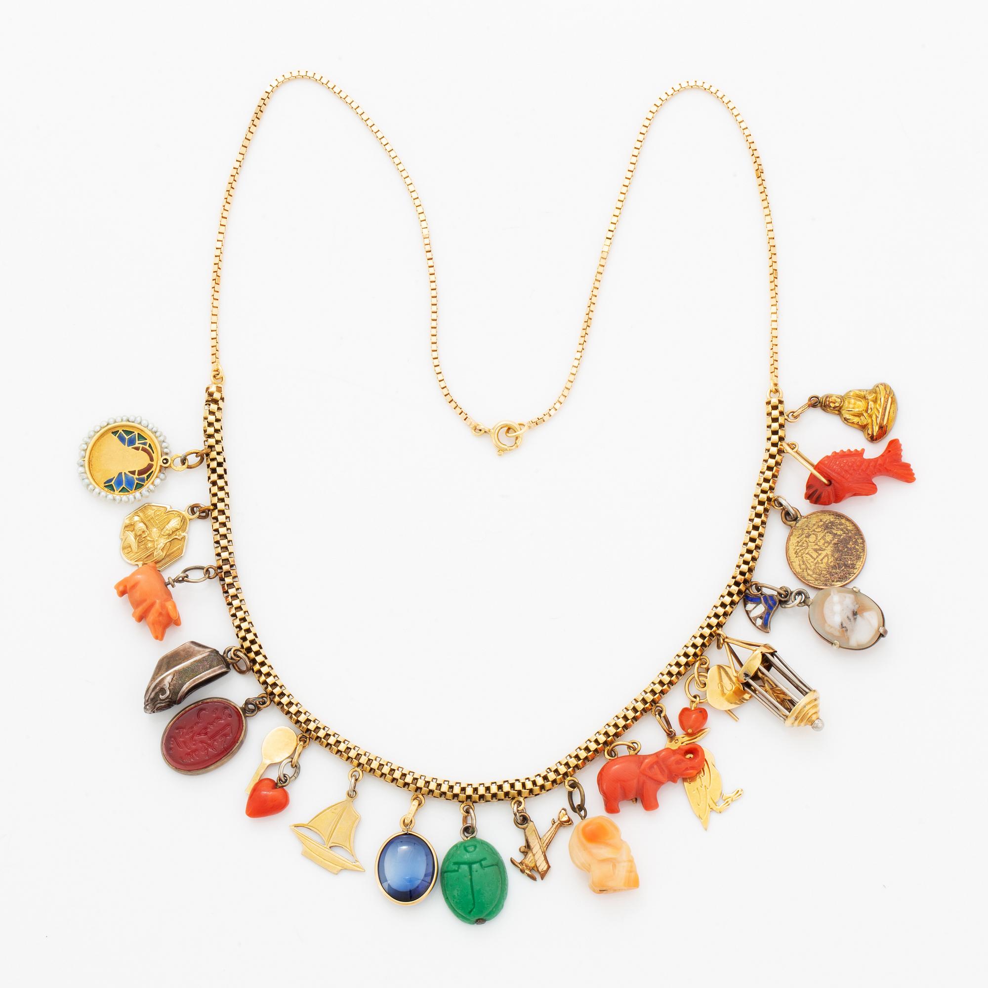 18K gold necklace with charms.