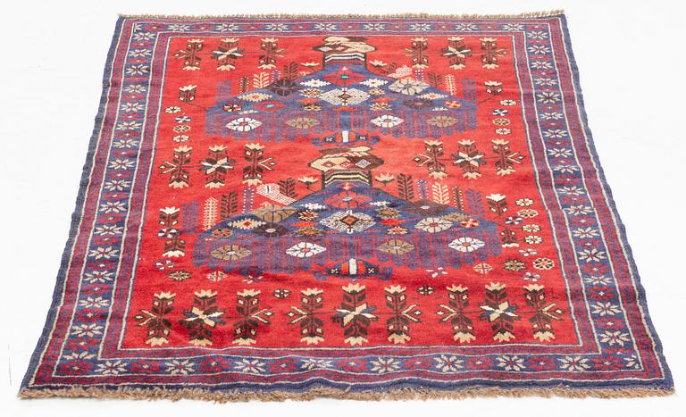 A carpet, circa 133 x 93 cm.