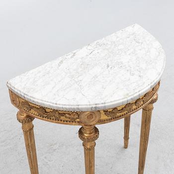 A Gustavian giltwood and white marble console table, Stockholm, late 18th century.