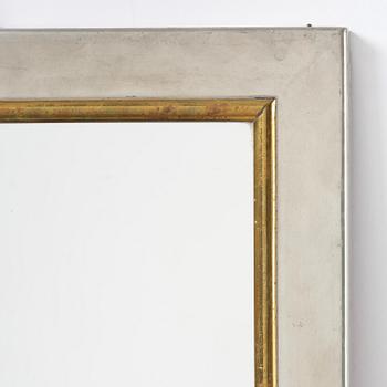 Firma Svenskt Tenn, a pewter and brass wall mirror model 2283, Firma Svenskt Tenn, Stockholm, 1952.