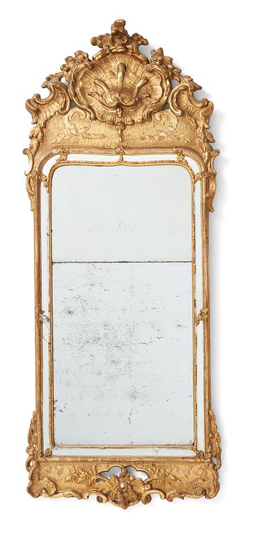 A Swedish Rococo mirror dated 1763.