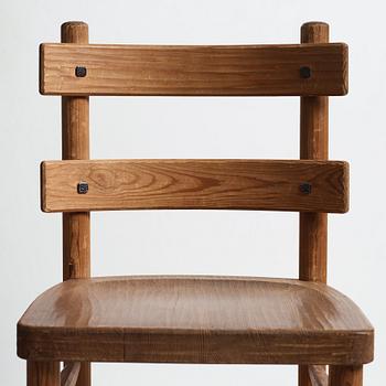 Axel Einar Hjorth, a set of four stained pine "Sandhamn" chairs, Nordiska Kompaniet, Sweden 1933.