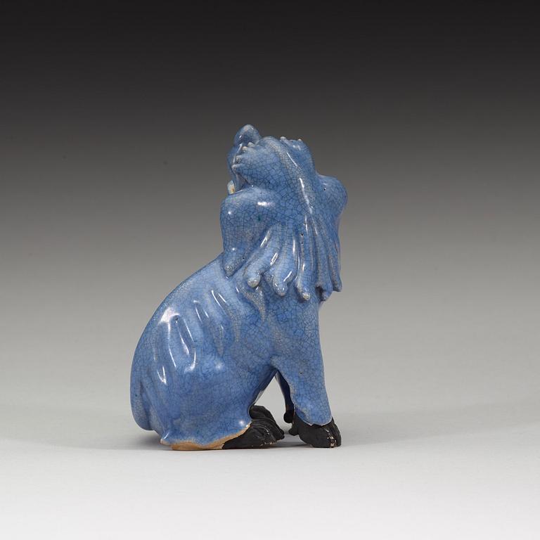 A blue glazed figure of a buddhist lion, Qing dynasty, Qianlong (1736-95).