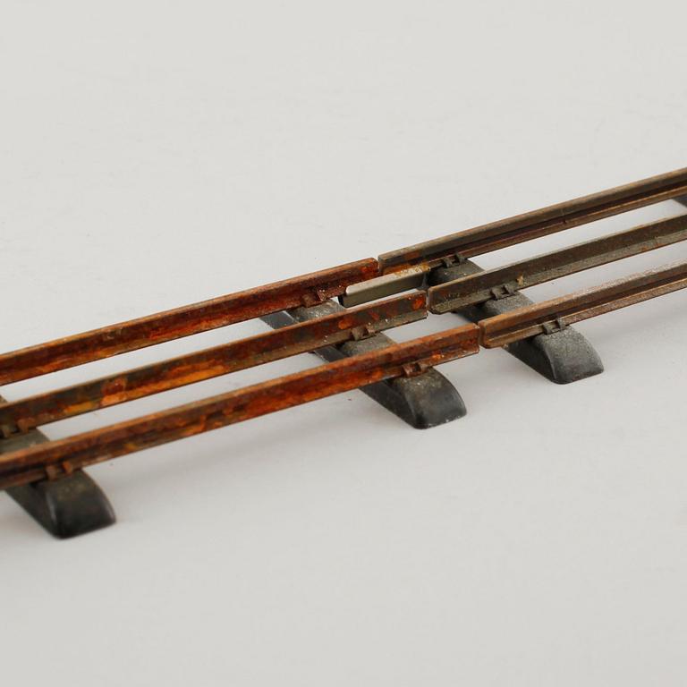 A 1940/50s model train set of 31 pcs in O-scale made by HAG, Switzerland.