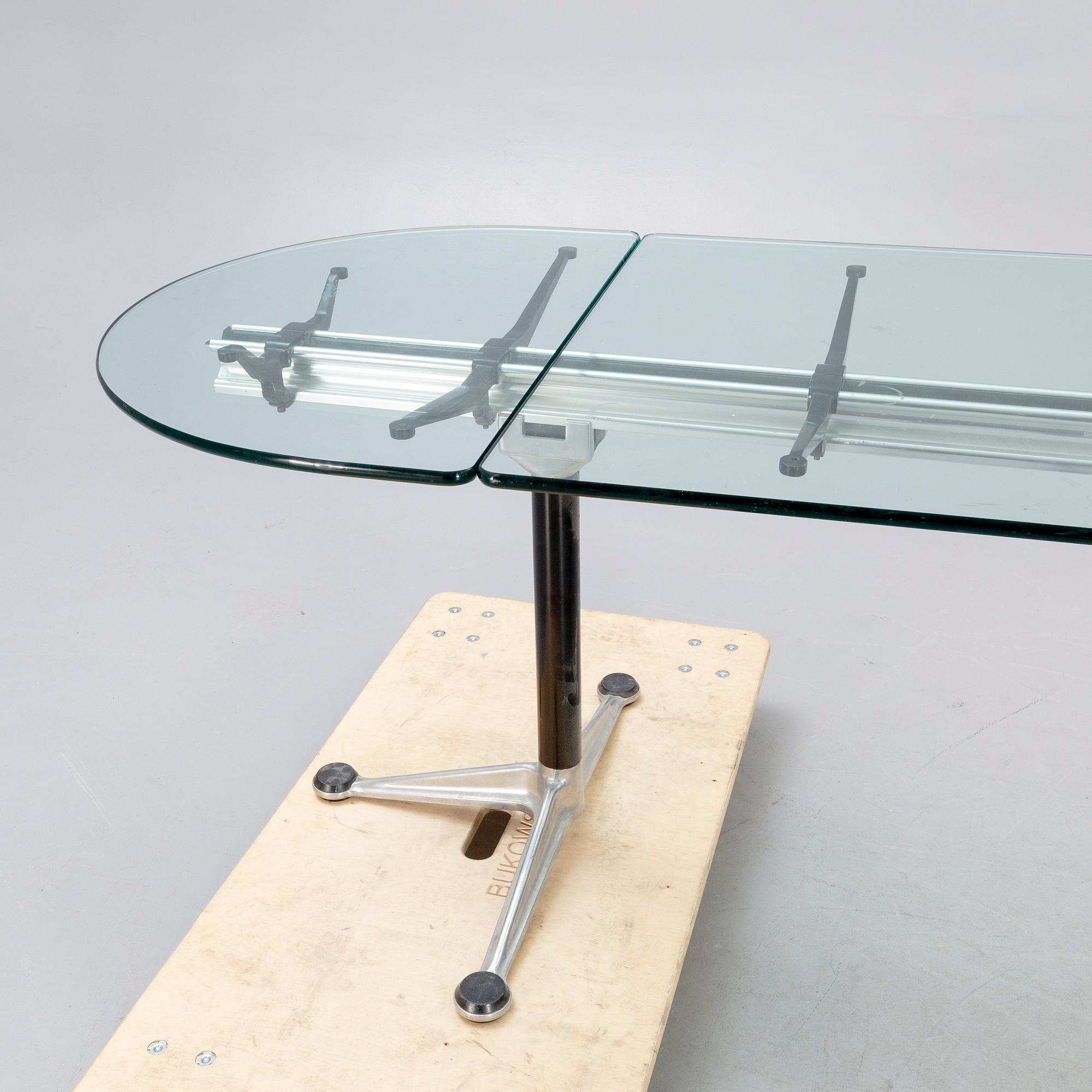 A Bruce Burdick 1980s glass and metall table for Herman Miller/Burdicks groups.
