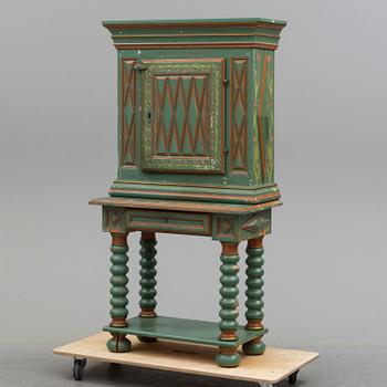 A second half of the 19th century wall cabinet with stand.