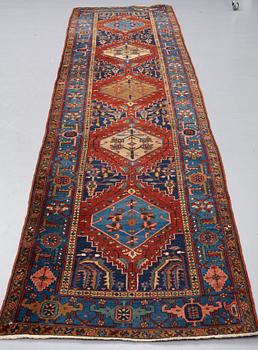 A RUNNER, a semi-antique northwest Persian, ca 421 x 96-99 cm.