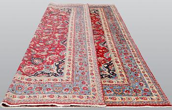 An old Meshed carpet, c. 342 x 252 cm.