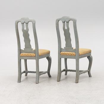 A pair of Baroque style chairs with older parts.