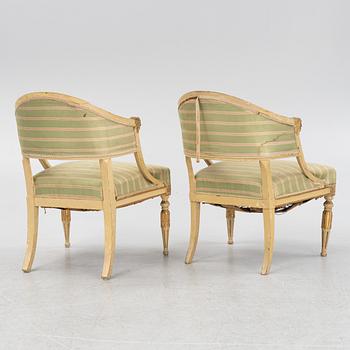 A matched pair of Gustavian style armchairs. One from around the year 1800 and one from around the year 1900.